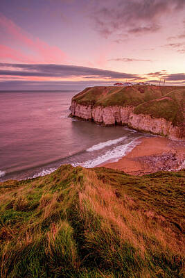 Wine Down Rights Managed Images - First Light at Thornwick Bay near Flamborough Royalty-Free Image by Tim Hill