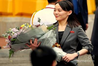 Politicians Photos - Flowers for a Korean Beauty by Michael Butkovich