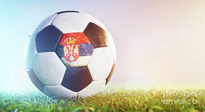 Sports Photos - Football soccer ball with flag of Serbia on grass by Michal Bednarek
