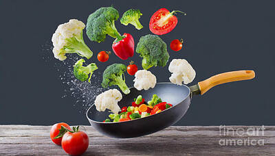 Food And Beverage Digital Art - Healthy cooking with various flying fresh vegetables on a frying pan by Viktor Birkus