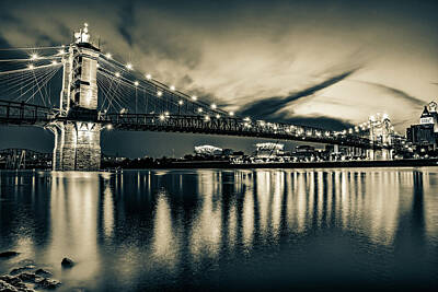 Football Royalty-Free and Rights-Managed Images - John A. Roebling Bridge On The Ohio River in Sepia - Cincinnati by Gregory Ballos
