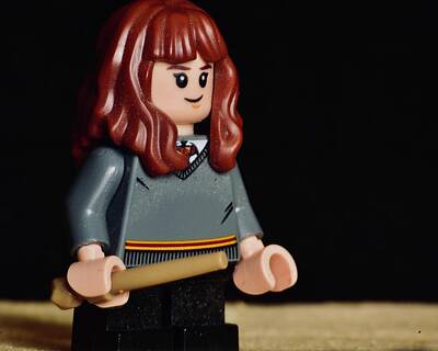 Vintage Buick Rights Managed Images - Lego Hermione Granger With Wand Royalty-Free Image by Neil R Finlay