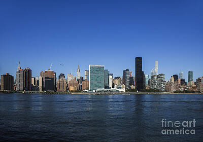 Quotes And Sayings - Manhattan Skyline featuring the U.N. Building by Diane Diederich