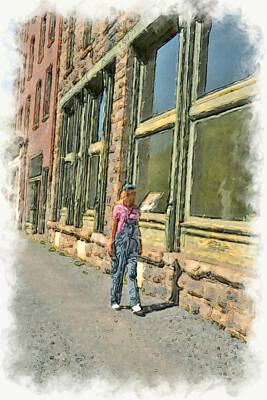 Mellow Yellow Rights Managed Images - Meranda Roe at Thurmond WV railroad station walking up the street Royalty-Free Image by Dan Friend