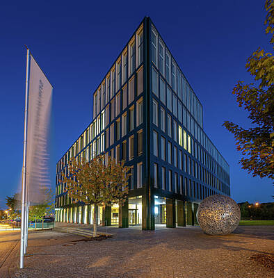 Grateful Dead Royalty Free Images - Modern office building in the blue hour Royalty-Free Image by Rainer Pickhard