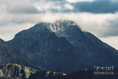 Mountain Rights Managed Images - Mountain peaks in clouds. Tatra Mountains, Poland Royalty-Free Image by Michal Bednarek