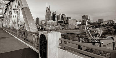 Skylines Royalty-Free and Rights-Managed Images - Nashville Tennessee Skyline and Pedestrian Bridge Sepia Panorama by Gregory Ballos