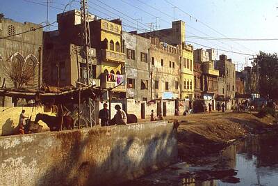 Road And Street Signs - Old City in Lahore Pakistan by Robert Ford