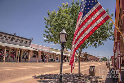Hearts In Every Form Royalty Free Images - Old Glory waving in Tombstone Royalty-Free Image by Darrell Foster
