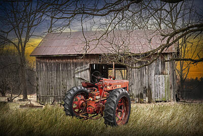 Randall Nyhof Royalty-Free and Rights-Managed Images - Red Tractor with Weathered Barn surrounded by Trees by Randall Nyhof