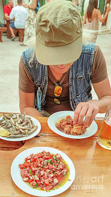 Beer Rights Managed Images - Restaurant Of Fish With Octopus Salad Royalty-Free Image by Benny Marty