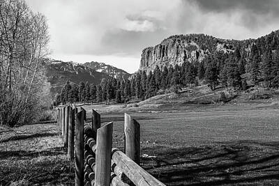 Landmarks Photo Royalty Free Images - Rustic Colorado Mountains and Wooden Fence Line in Monochrome Royalty-Free Image by Gregory Ballos