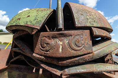 Steampunk Royalty Free Images - Rusty old GMC truck grill badge Royalty-Free Image by Cindy Shebley