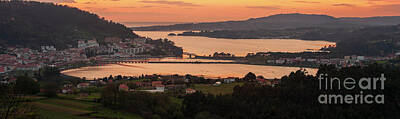 Photo Royalty Free Images - Serene dusk panorama of the medieval fishing town of Pontedeume with its iron and stone bridge sky Corua Galicia Royalty-Free Image by Pablo Avanzini