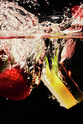 Food And Beverage Rights Managed Images - Splashing Fruite Royalty-Free Image by Jon Glaser