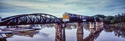 Transportation Royalty Free Images - State Railway of Thailand locomotive 3004 heads across the Bridge over the River Kwai Royalty-Free Image by Jim Pearson