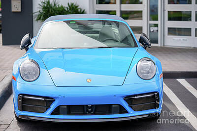 Sultry Plants Rights Managed Images - Stock image Blue Porsche car front view Royalty-Free Image by Felix Mizioznikov