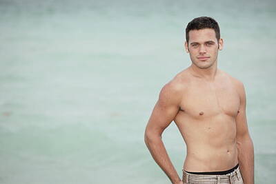 Beach Photos - Stock photo man without shirt posing on water background by Felix Mizioznikov