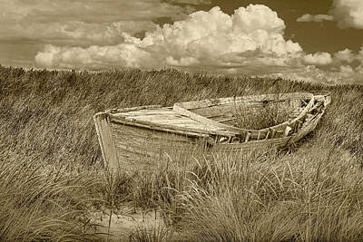 Randall Nyhof Royalty-Free and Rights-Managed Images - Stranded Abandoned Wooden Boat in a Sea of Grass in Sepia Tone by Randall Nyhof