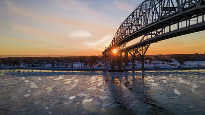 Western Buffalo Royalty Free Images - Sunburst at the Blue Water Bridge Royalty-Free Image by Robert Hover