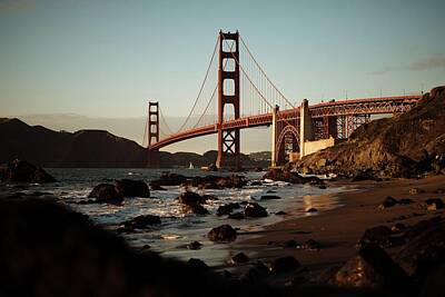 Lighthouse - Sunset at Golden Gate Bridge as seen from Marshall Beach  - Golden Gate Bridge, San Francisco during day - San Francisco, CA, USA by Julien