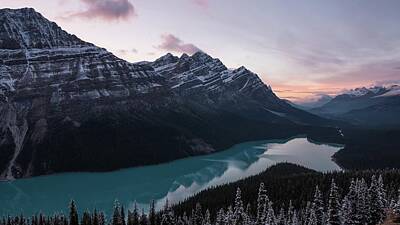 The Art Of Pottery - Sunset over Peyto Lake - mountain alps near river and trees by Julien