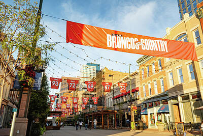 Football Photos - Threads Of Denver Unity In Larimer Square by Gregory Ballos