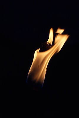 Minimalist Superheroes Rights Managed Images - Burning torch in darkness Royalty-Free Image by Nathanael Rychen