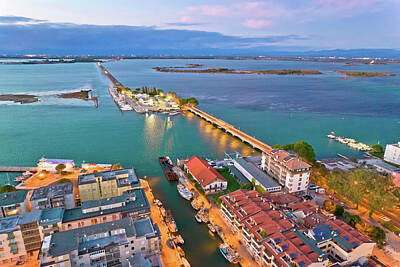 Landmarks Photos - Town of Grado archipelago and bridge to mainland aerial evening  by Brch Photography