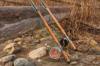 Target Threshold Photography - Two salmon spey fly rods resting on a log in the late afternoon sun by Snap-T Photography