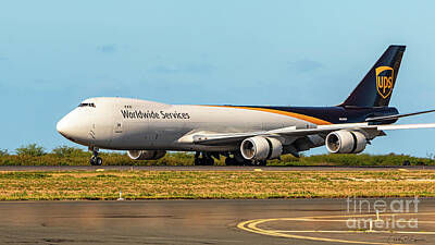 Ring Of Fire Royalty Free Images - UPS Boeing 747 800 N609UP taxiing after Landing Royalty-Free Image by Phillip Espinasse