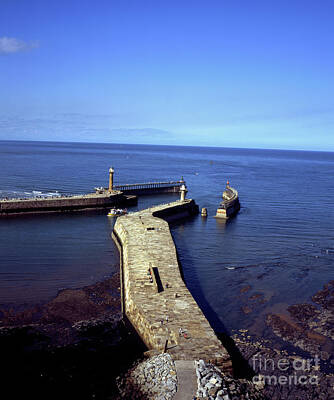 Clouds - Whitby   Pier Lights or Breakwater Lights harbour entrance Whitby North Yorkshire England by Michael Walters