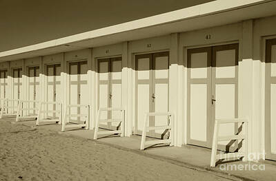 Kitchen Signs Rights Managed Images - Wooden cabins at beach. Sepia Royalty-Free Image by Elena Dijour