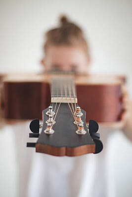 Musician Royalty-Free and Rights-Managed Images - Wooden guitar head by Vaclav Sonnek
